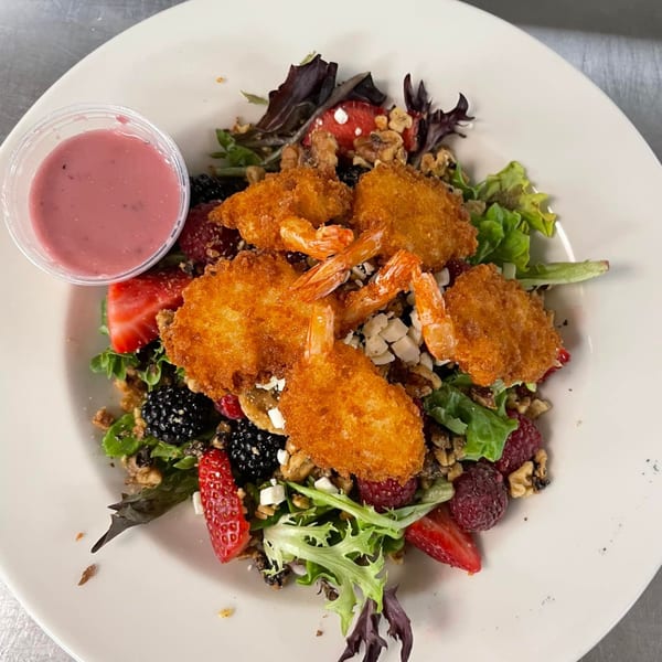 Dunmire’s on the Lakes' berry salad with fried shrimp, mixed greens, walnuts, and a side of dressing.