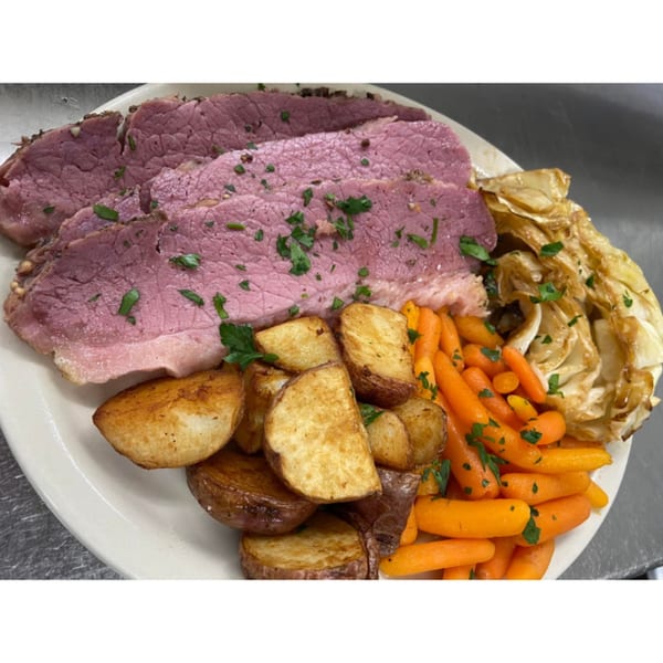 Dunmire’s on the Lakes' corned beef with roasted potatoes, baby carrots, and cabbage.
